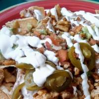 Super Nachos · Choice of meat and cheese (monterey jack or nacho cheese), beans, jalapenos, pico de gallo, ...