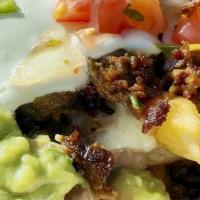 Carne Asada Fries · Asada or other choice of meat, beans, choice of cheese (monterey jack or nacho cheese), jala...