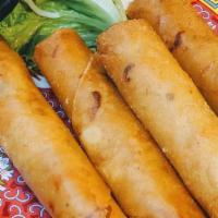 26. Cha Gio - Egg Roll · Egg rolls w/ Vietnamese fish sauce. ( 4 rolls )