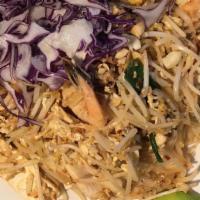 77. Pad Thai · Shrimp, chicken, tofu, egg, peanut, and bean sprout with pan-fried Thai style rice noodles. ...