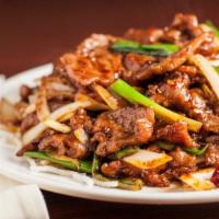 Mongolian Beef · Hot & spicy. Beef, green onion and onion in hot brown sauce.