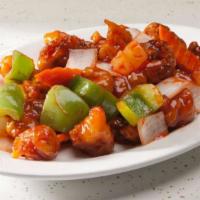 Sweet & Sour Pork · Deep fried pork, bell pepper, onion, pineapple and carrot in sweet & sour sauce.