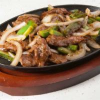 Black Pepper Beef on Sizzling Plate · Hot & spicy. Beef, bell pepper and onion in black pepper garlic sauce.