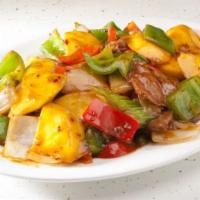 Mango Beef · Hot & spicy. Sliced beef, mango, bell peppers and onion in spicy brown sauce.