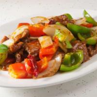 Hunan Lamb · Hot & spicy. Lamb, bell pepper, zucchini and onion, chili in hunan sauce.