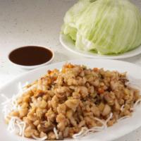 Chicken in Lettuce Cups · Minced chicken, black mushroom, bamboo shoot, water chestnut, carrot and onion in oyster sau...