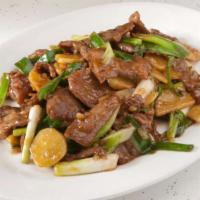 Ginger Beef · Sliced beef, ginger and green onion in brown sauce.