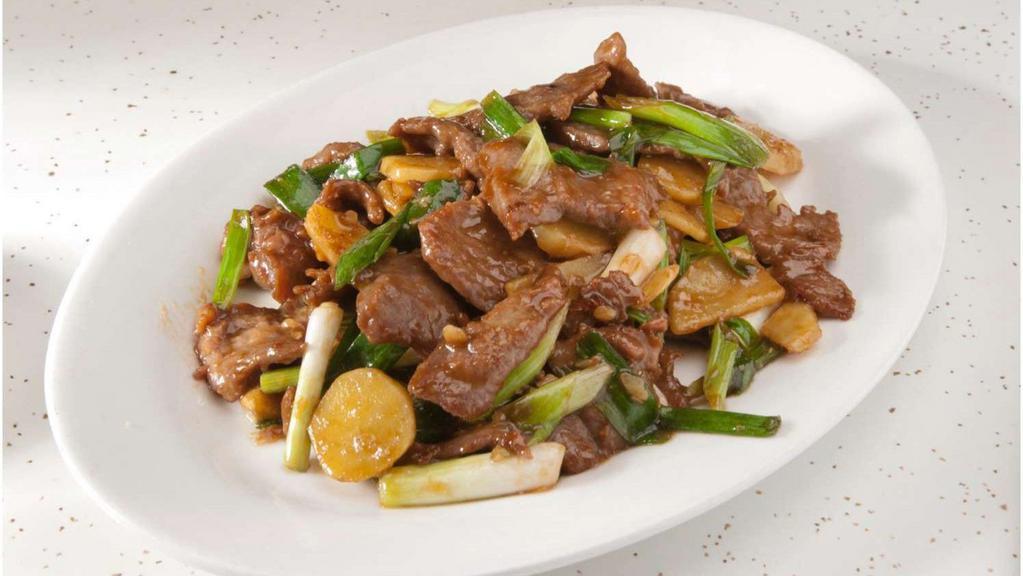 Ginger Beef · Sliced beef, ginger and green onion in brown sauce.