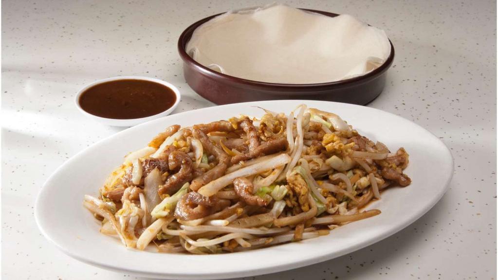 Mu Shu Pork · Shredded pork, dried lily flower, cabbage bamboo shoot, bean sprout, egg and 6 pancakes.