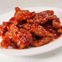 Mandarin Spareribs · Deep fried spareribs in sweet and sour sauce.