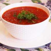 Bowl of  Borsch w/meat · Pork, beets, potatoes, cabbage, and carrots. Served with sour cream and sprinkled with dill ...