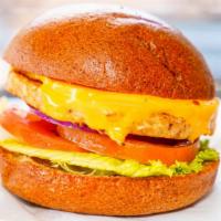 Veggie Burger · Served on a wheat bun, mayo, mustard, lettuce, tomato, onion, side cole slaw.