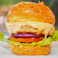 Turkey Burger · Served on a artisan brioche sesame bun with mayo, mustard, lettuce, tomato, onion, side cole...