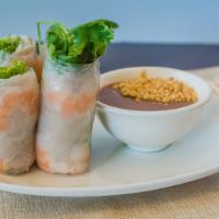 1. Fresh Spring Rolls (2 Pc) · Thin slices of pork, shrimp, lettuce, mint, cilantro, rice paper wrap, house peanut sauce.