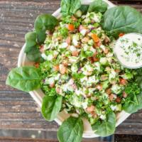 Israeli Salad · Chopped cucumbers, tomatoes, onions, parsley, lemon juice, extra virgin olive oil, a pinch o...