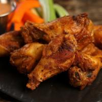 Cajun · 8 Cajun dry rub wings, served with carrots & celery and a choice of blue cheese or ranch for...
