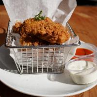 Chicken Wings · Seasoned and fried served with spicy sauce.