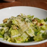Caesar Salad · Hearts of romaine, croutons, parmesan cheese and Caesar dressing.