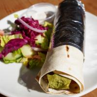 Falafel Wrap · Lettuce, tomato, cucumber, onion, hummus, pickles and tahini sauce.
