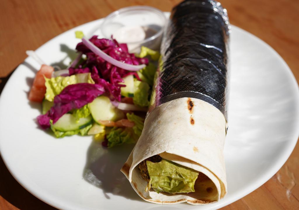 Combo Gyros Wrap · Lamb & beef gyros, chicken gyros, lettuce, tomato, cucumber, onion and tzatziki sauce.