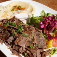 Lamb & Beef Gyros Plate · Slow cooked, thinly sliced, marinated lamb and beef. Served with rice, salad, hummus and pita.