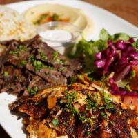 Combo Gyros Plate · Slow cooked, thinly sliced, marinated lamb & beef gyros-chicken gyros. Served with rice, sal...