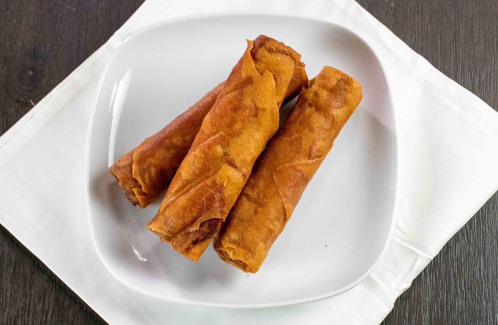 Imperial Egg Rolls (Cha Gio) (3) · Vegetarian option available. Crispy spring rolls stuffed with pork and shrimp, or tofu, taro, carrots, onion, and glass noodles.  Served with nuoc cham dipping sauce.