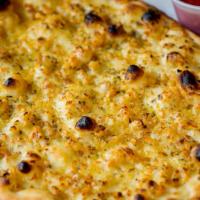Garlic Flat Bread · Parmesan cheese, garlic, oregano, olive oil.