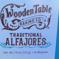 Case of 8 Traditional Alfajores · Sixteen handcrafted shortbread cookies joined with dulce de leche and rolled in grated cocon...