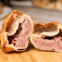 Ham & Cheese Empanada · Our House Made Ham & Cheese empanadas are made with Hickory smoked Cooked ham, a blend of Ja...