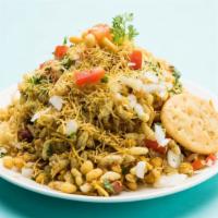 Bhel Puri · A popular Indian street food made with puffed rice, peanuts, chutneys, spice powders, veggie...