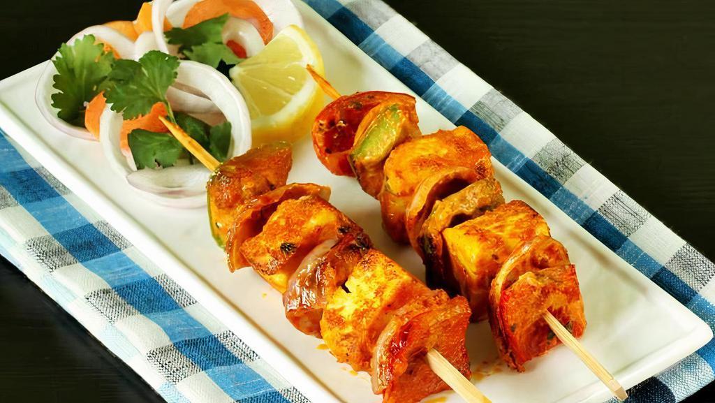Methi Paneer Tikka · Gluten free. Cottage cheese, bell pepper, onion marinated in spices and skewered in a clay oven.