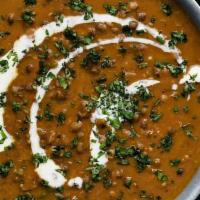 Daal Makhani · Gluten free. Whole black lentils simmered on low fire with red chili, ginger, garlic, tomato...