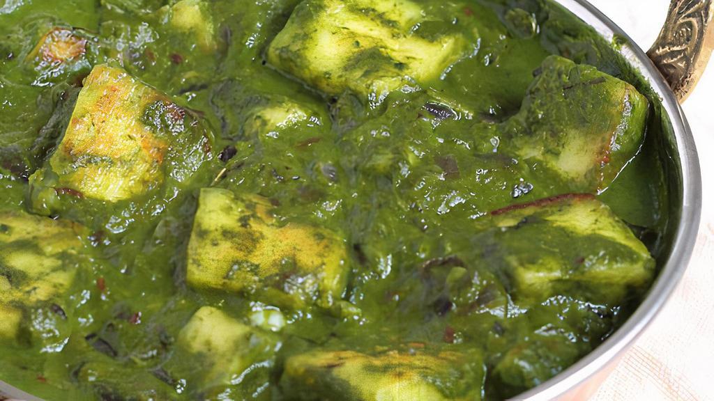 Palak Paneer · Gluten free. Watsonville spinach cooked with cottage cheese, garlic and cream.
