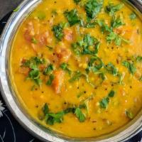 Tadka Daal (VEGAN) · Gluten free, vegetarian. Combination of yellow and red lentils tempered with garlic, red chi...