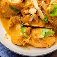 Chicken Korma · Nuts, gluten free. Chicken chunks cooked with blend of spices, brown onion, cream and cashew...