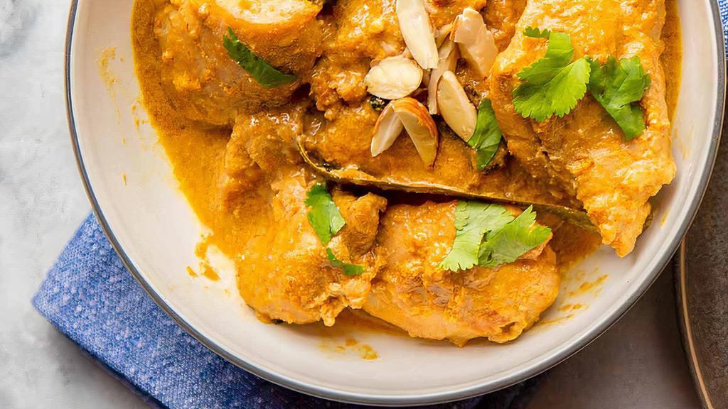 Chicken Korma · Nuts, gluten free. Chicken chunks cooked with blend of spices, brown onion, cream and cashew sauce.