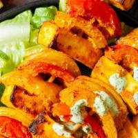 Paneer Tikka · Gluten free. Cottage cheese marinated in hung yogurt and spices skewered in clay oven.