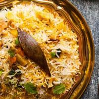 Vegetarian Biryani · Gluten free. Saffron basmati rice, mixed vegetables, mint, fried onions cooked in dum style.