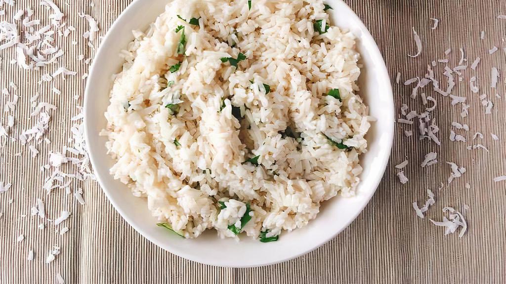 Coconut Rice · Gluten free, vegetarian. Rice, mustard seeds, coconut milk and curry leaf.