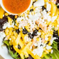 Chipotle Chop · Organic spring mix, spicy chicken, ripe mango, corn, black beans, goat cheese, chipotle lime...