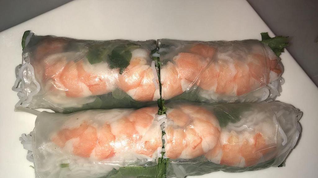 Fresh Shrimp Spring Rolls · Rice paper rolls with steamed shrimps, lettuce, mint, bean sprouts dipped with peanut sauce.