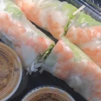 Veggie Spring Roll · Rice paper rolls with mushroom, carrot, lettuce, mint bean sprouts dipped with peanut sauce.
