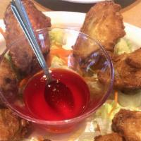 Crispy Fried Chicken Wings (8) (Cánh Gà Chiên) · Curry coated chicken wings fried to a crisp. Serve with your choice of sweet and sour or tam...
