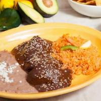 Molé Poblano · Boneless, skinless chicken with our own special mole poblano made from scratch. We use over ...
