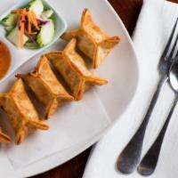Crab Rangoon · Stuffed crab meat in wonton skin with cream cheese, onion, green onion, bell pepper, and car...