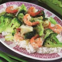 #25. Com Trang Xao Tom · Soy sauce shrimp over rice.