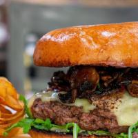 The True Burger · 100% Angus beef patty, mushrooms, swiss cheese, caramelized onions, arugula and roasted garl...
