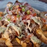 Carnitas Fries · French Fries Smothered In Pork Carnitas, Chipotle Crema, Salsa Verde, Cotija Cheese And Pico...