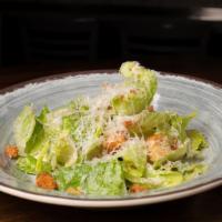 Caesar Salad  · A bed of Romaine, dressed with our house Caesar dressing, garlic croutons and Grana Padano c...